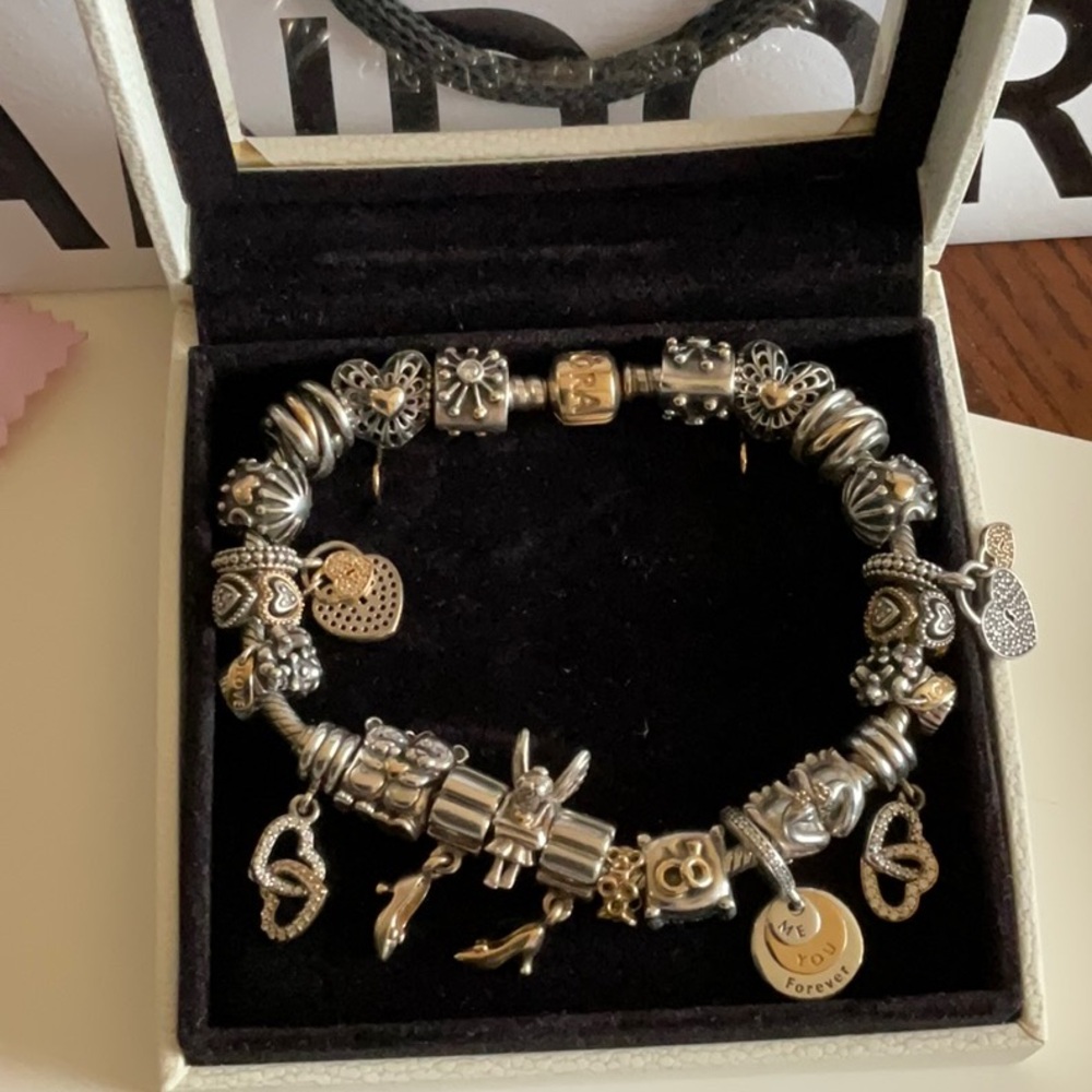 Pandora two tone bracelet with 24 two tone Pandora charms